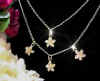 hawaiian_jewelry_plumeria_layer_necklace_2.jpg (17273 bytes)