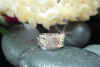 hawaiian_jewelry_white_hoku_wedding_rg_ft.jpg (16064 bytes)
